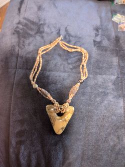 handmade beaded wood necklace in an ethnic boho style.