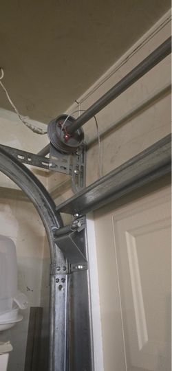 Overhead Garage Door Spring Opener Off Track Adjustment Replace and Parts
