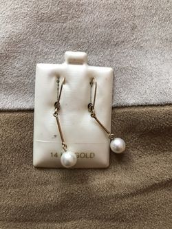 Gold and real pearl earrings,slightly worn