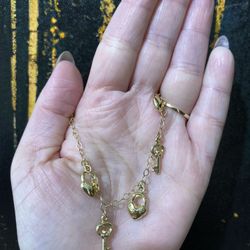 14k FANCY CHARM BRACELET 