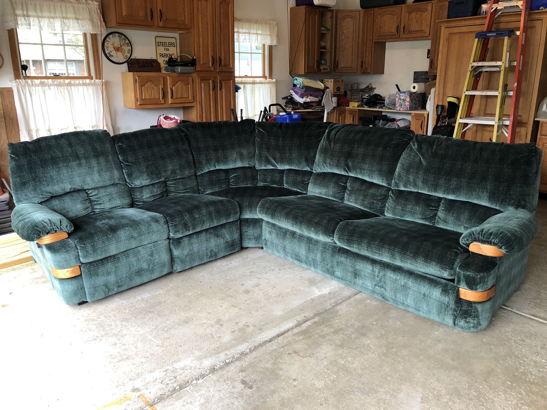 Sectional sofa couch with recliner and pull out bed.(REDUCED)