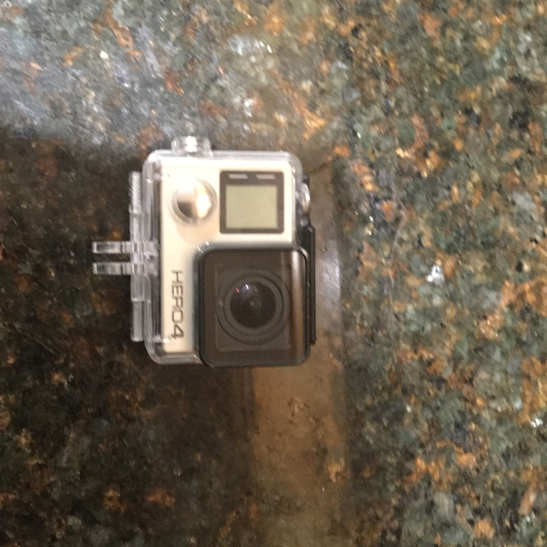 GoPro Hero 4 with accessories And charging Cable
