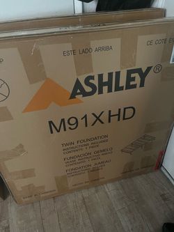 Ashley’s metal frame and twin size mattress