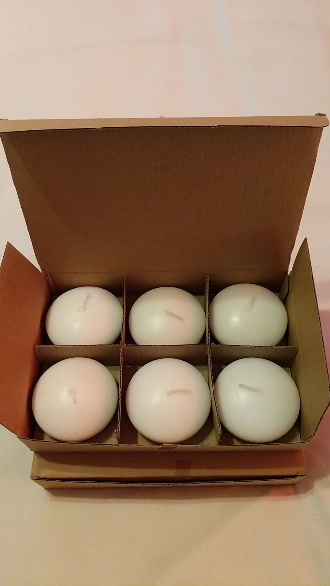 3" unscented white floating candles (10)