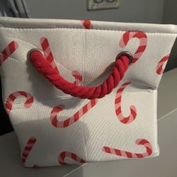 White and red candy cane storage basket