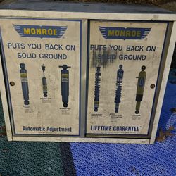 Vintage Monroe auto parts Cabinet
