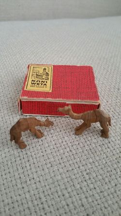 Very nice tiny vintage hand carved camels from Jerusalem, Israel.