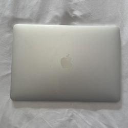 Silver MacBook Pro with Touch Bar