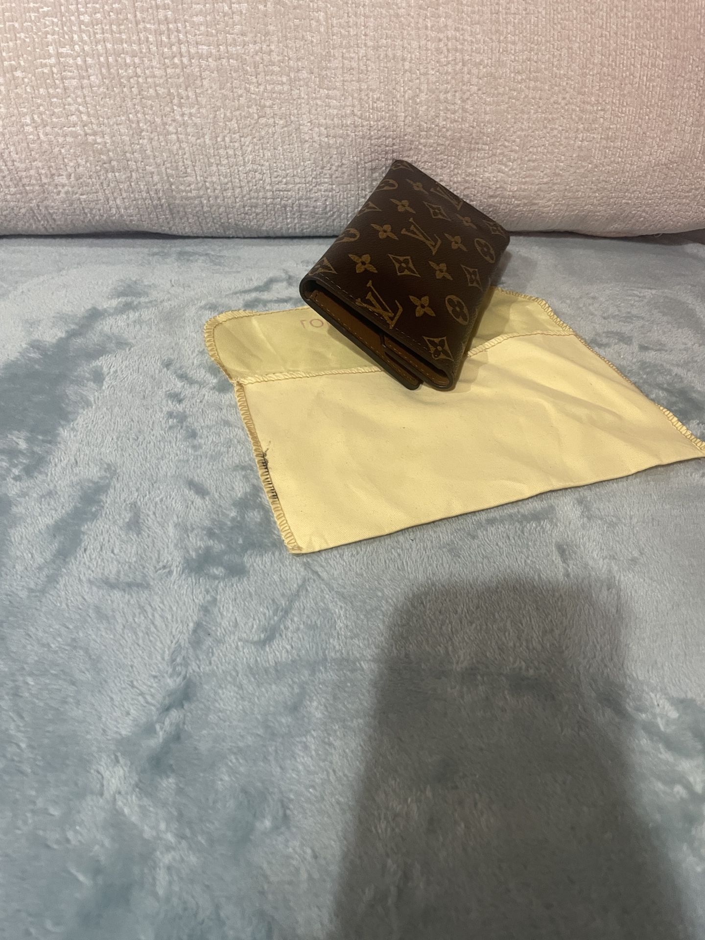 Cartera $50