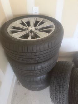 Stock rims and tires for Ford