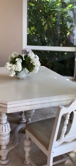 Table with four dining chairs.