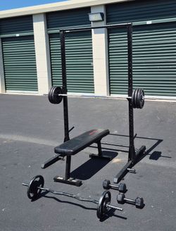 Bench press ,dumbbells  squat rack with weights (Free Delivery)