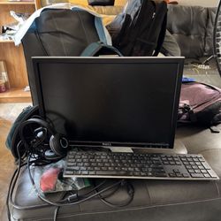 Work At Home Set Up, Monitor, Wireless Keyboard, Wireless Mouse, And Headset