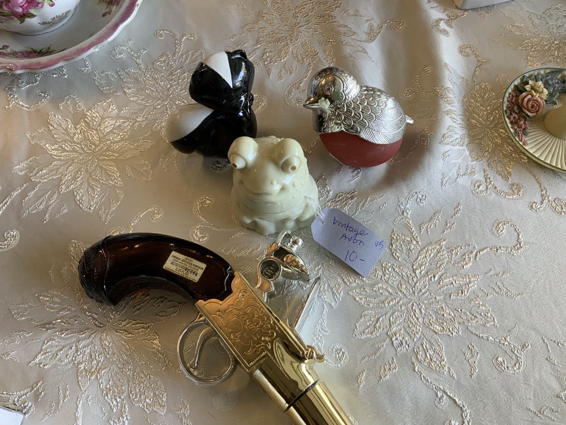 Set Of Four Vintage Avon Bottles 