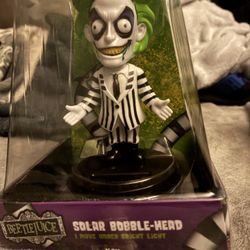 Beetle Juice Solar Bobble Head