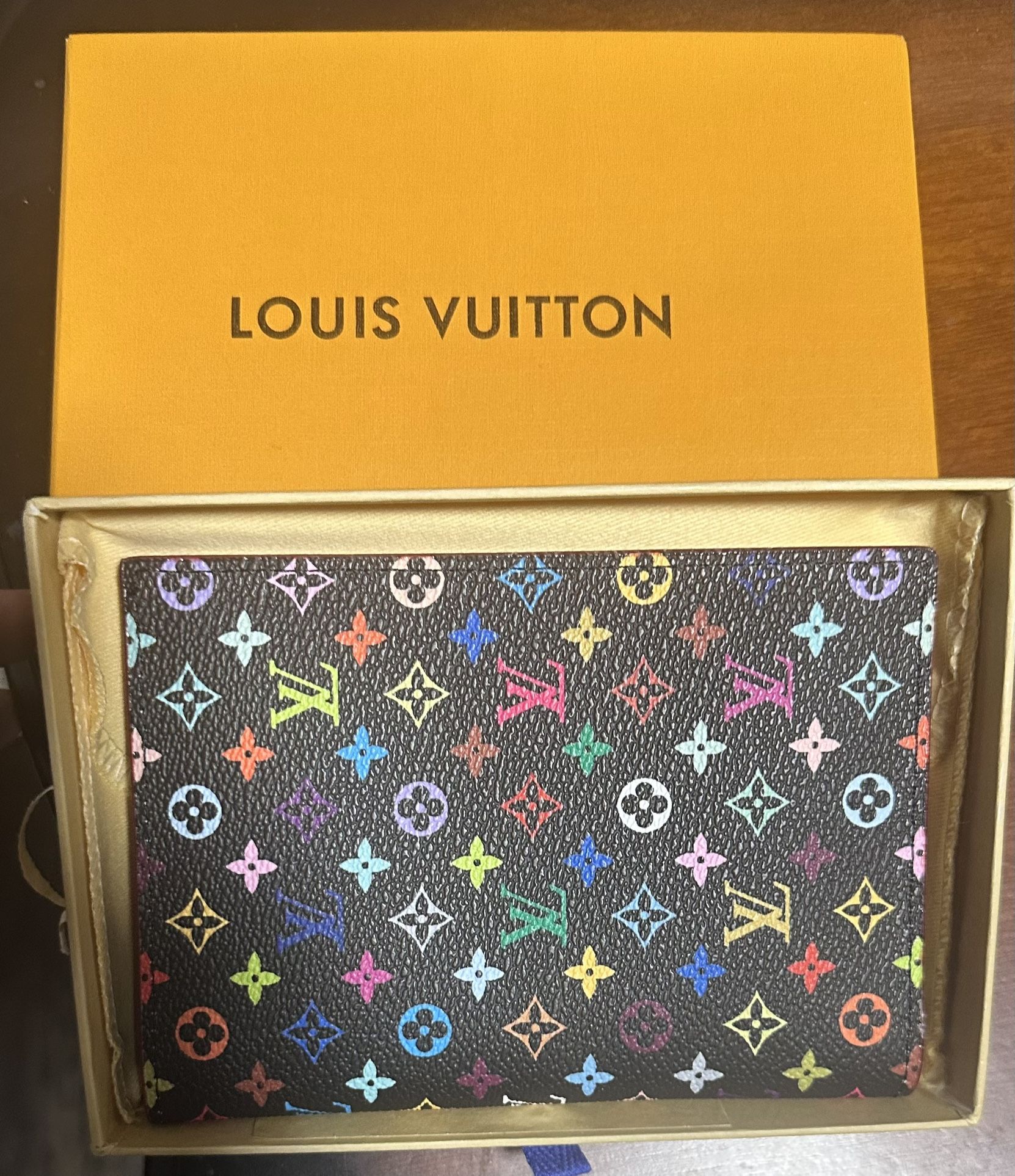 Louis Vuitton wallet X Takashi Murakami collection.