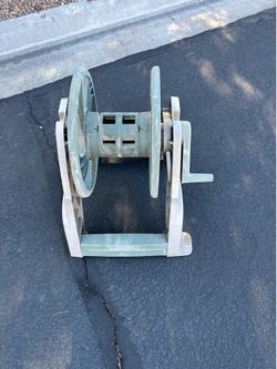 Garden hose reel caddy