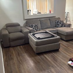 Sofa Chaise, Recliner, And Ottoman $300