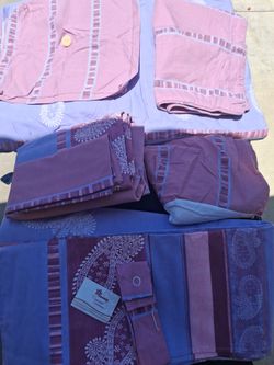 Conforte Vianney set twin , come with set of sheets, curtains set. $35.00