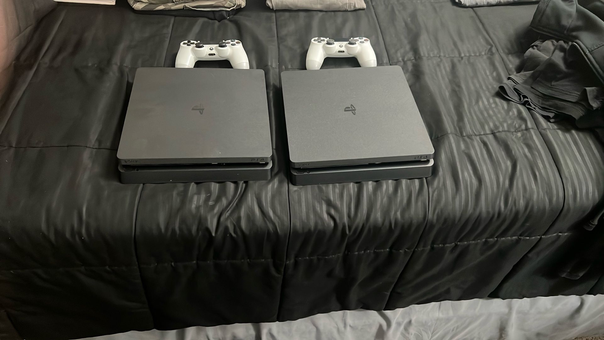2 Perfect Condition PS4s Both With a White Controller