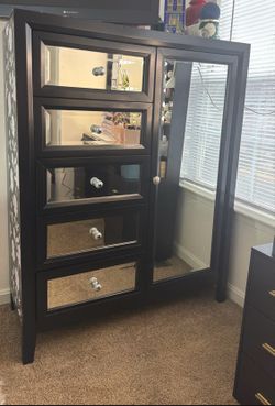 Black dresser with metals