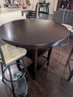 Free Nebraska Furniture Mart Table and Target bar stools