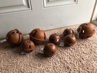 Brand new metal round wind bells. Two dollars each for the small ones and three dollars each for the big ones