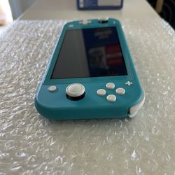 Nintendo Switch Lite w/ Game