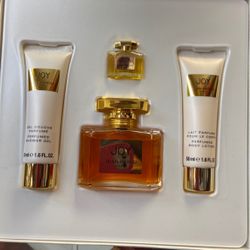 Joy 4pcs. Gift Set (2.5oz. EDT. + Mini .p9oz. + 1.6oz. Perfumed Body Lotion + 1.6oz. Perfumed Shower Gel) Women