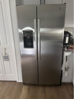 GE stainless steel counter depth side by side refrigerator