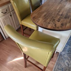 Martini olive green bar stools 3 (4 total retro counter height upholstered chairs but one needs tlc)