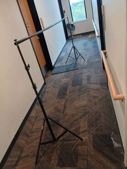 10-ft light stand with two tripods with three extensions