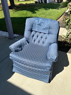 Light blue swivel rocking chair