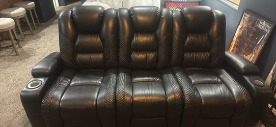 Black leather reclining sofa