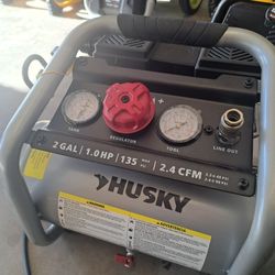 Husky2 Gal. 135 PSI Portable Electric Oil-Free Quiet Jobsite Air Compressor with Dual Pressure Gauges and 1-Quick Coupler