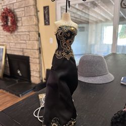 beautiful dresses and decorations to organize your jewelry each of these are $8.
