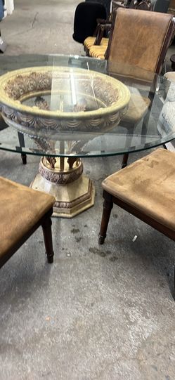 Round dining table with four chairs 48”x48”x30”h heavy glass