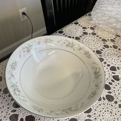 9”  x 2.75” deep Royal Majestic fine china bowl in the “Cannes 8078” pattern. delicate floral design with pastel pink and blue flowers and a thin silv