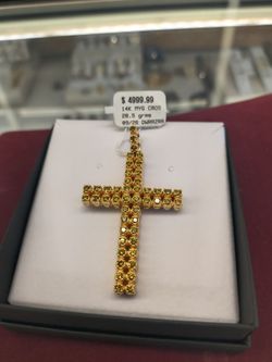 14ksolid gold yellow diamond cross pendant 28.5 grams layaway available 10% Dwon if you interested please make sure you ask for Maribel thank you
