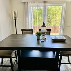 Farmhouse style counter height table with 4 chairs and bench