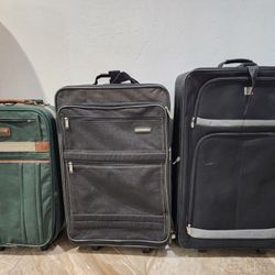 Softside spinner luggage. 
$10 each or $20 for all three 