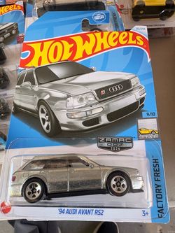 Collectible Hot Wheels '94 Audi Avant RS2 die-cast car. This silver Zamac edition has a 1:64 scale and is part of the Factory Fresh series. The item i