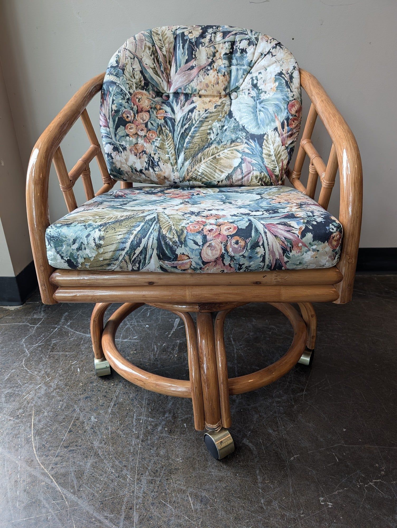 Vintage Rattan Swivel Caster Chair with Tropical Floral Cushions