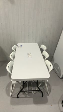6ft White Folding Table with 6 Chairs $120