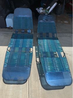Two vintage long chair beds