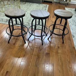 Valebeck Brown Swivel Bar Stool Set of 3