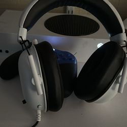 xbox with 2 elite controllers and a headset 