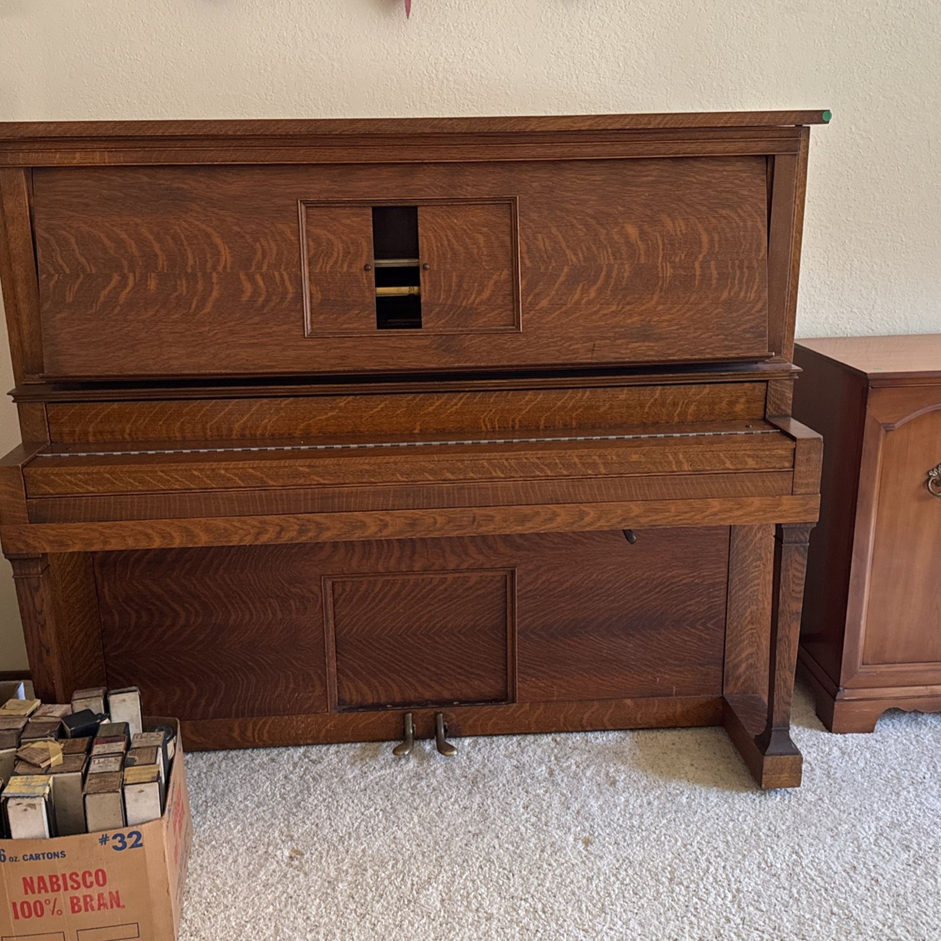 Player piano with 150 Rolls. Free!