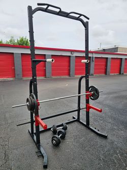 Fitness Sturdy  💯 Pounds+Bar+Weights Plates+ Pull Up Tower-Deeps Station+ Dumbbells. Deliveryfee.

Versatile home gym set includes a black steel powe