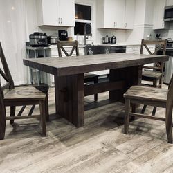 Reclaimed wood dining table with matching 4 chairs (72” x 39” x 31”). In Excellent Condition.  
